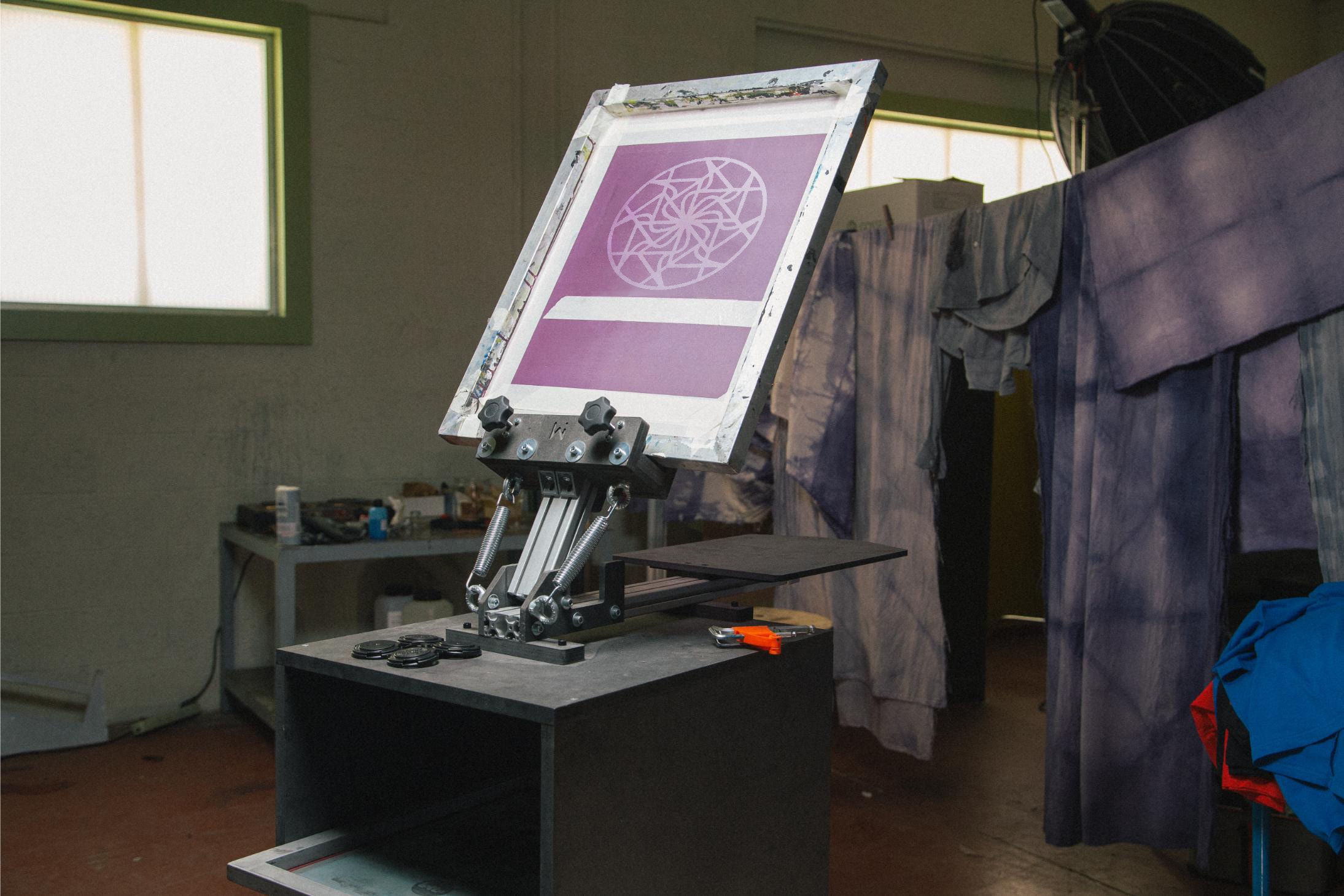 Mekanika screen printing press in a workshop